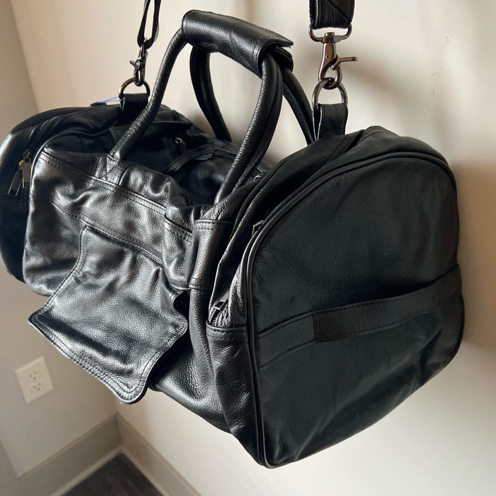 Brand new black leather duffel